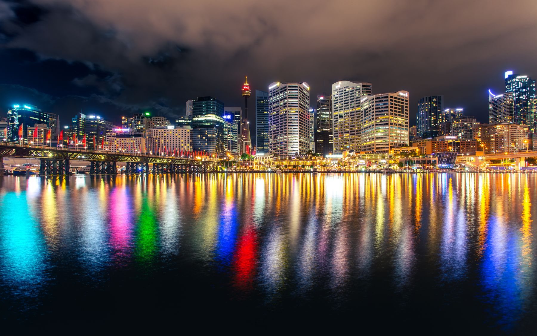 Darling Harbour and the Sydney skyline reflected at night