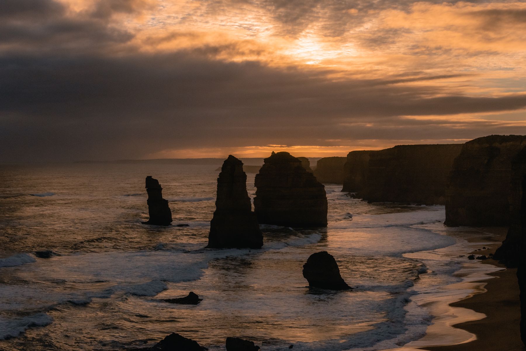 The Twelve Apostles sea stacks at sunset on the Great Ocean Road